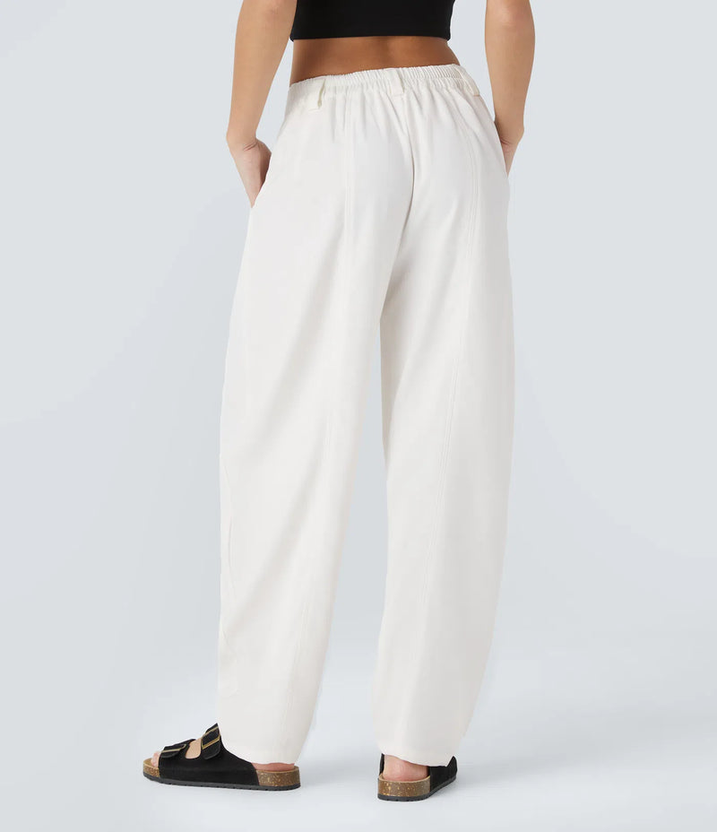 Pantalón oficina pierna barril bolsillo lateral plisado tiro medio